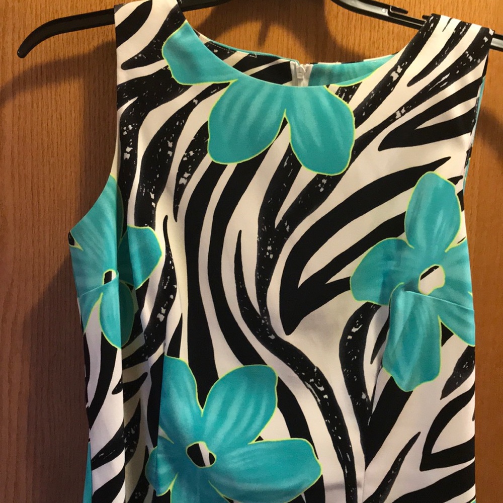 Teal and black floral, fitted shift dress.